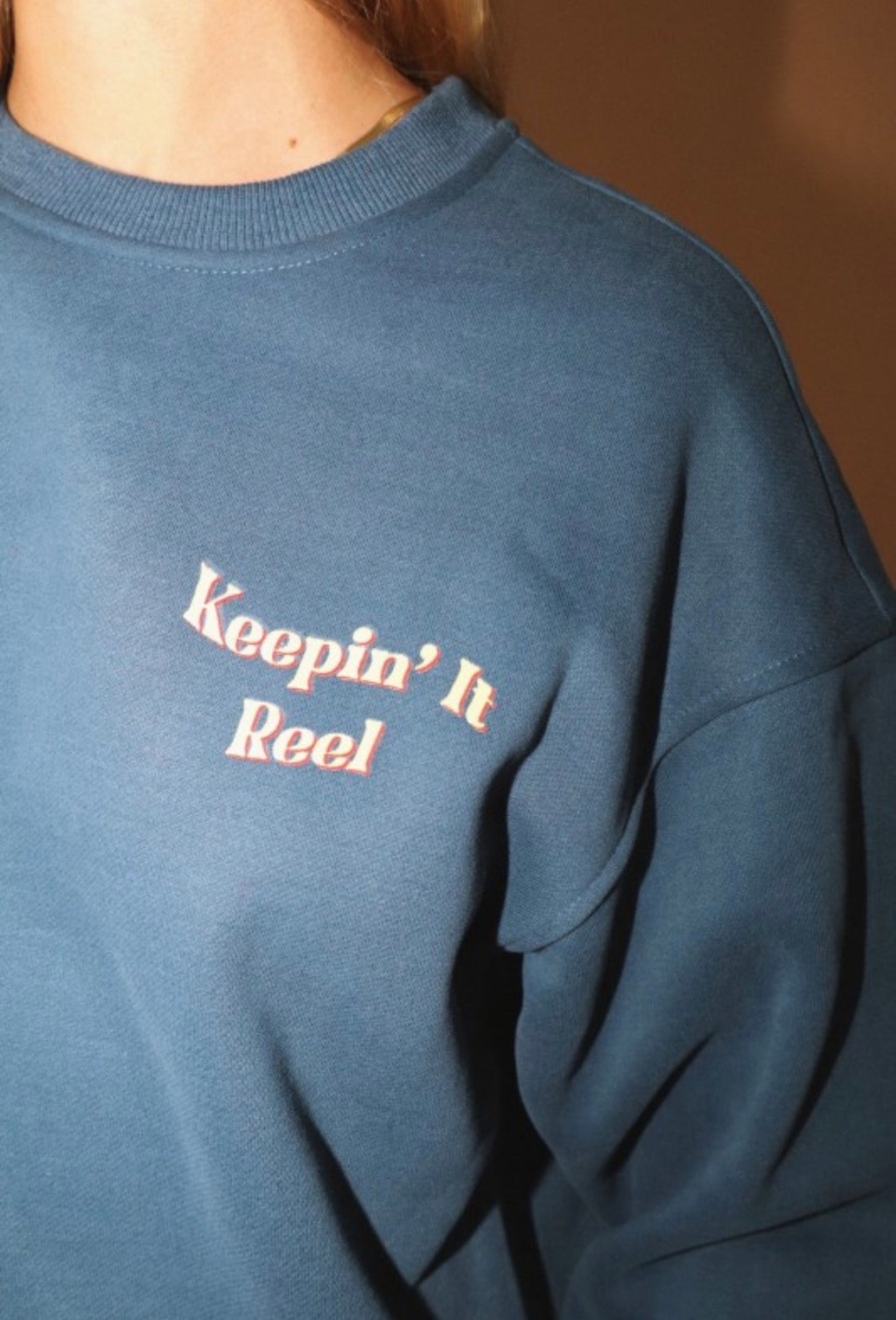 Keepin’ it reel pullover